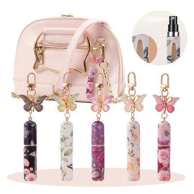 Quality New Popular 5ml Fragrance Bottles Fine Mist Spray Cosmetic Perfume Samples Aromatherapy Bottles Portable Perfume Bottles Travel Perfume Vials with butterfly-shaped keychain cute girly perfume bottles factory